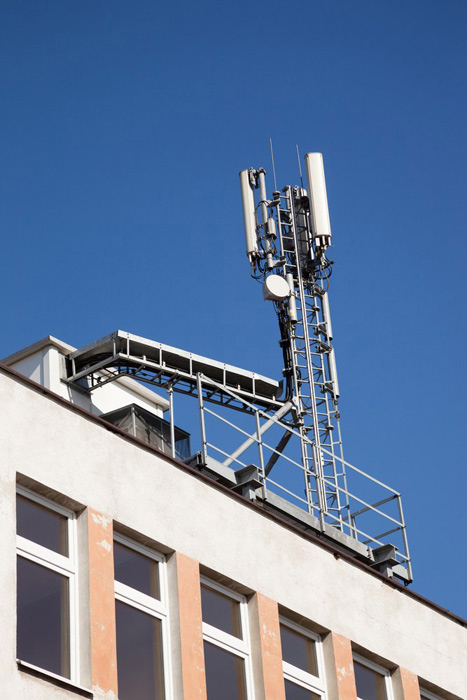 wireless communications antenna on a building